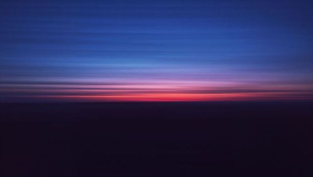 Abstract Sunset Gradient with Vibrant Horizons