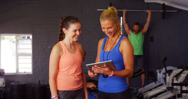 Personal Trainer Coaching Young Woman in Gym - Download Free Stock Images Pikwizard.com