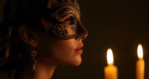 Mysterious Woman In Ornate Mask by Candlelight