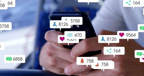 Businessman tapping smartphone showing notification bubbles and social alerts in flight