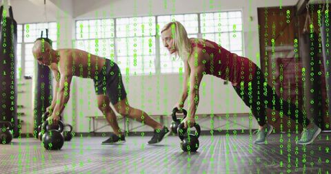 Partners performing offset kettlebell plank with green binary code overlay in gym