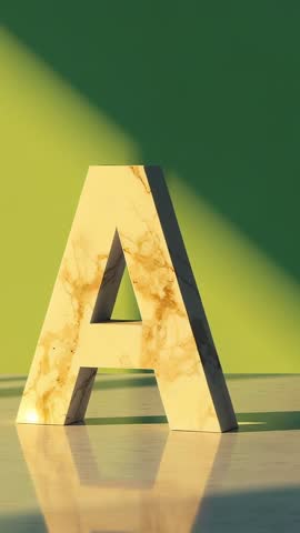 Marble letter A bathing in diagonal golden sunlight on green backdrop vertical video