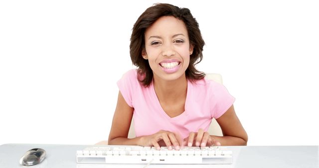 Happy African American Woman Typing on Keyboard Smiling Confidently - Download Free Stock Images Pikwizard.com