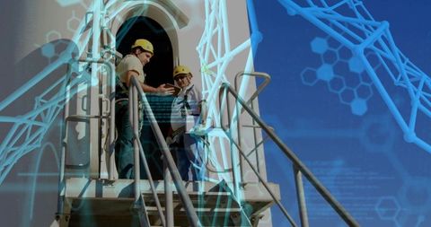 Technicians analyzing data on aerospace equipment with digital overlay