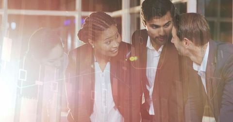 Diverse Business Team Collaborating with Digital Financial Data