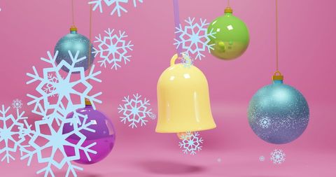 Colorful Christmas Ornaments with Snowflakes on Pink Background