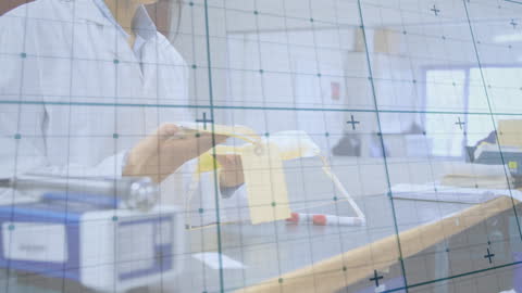 Female Doctor Analyzing Data in Laboratory Environment