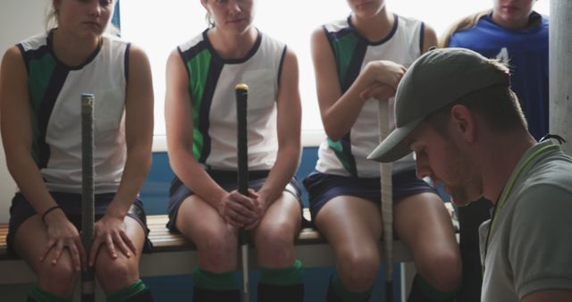 Field Hockey Coach Giving Strategy Talk to Female Team - Download Free Stock Images Pikwizard.com