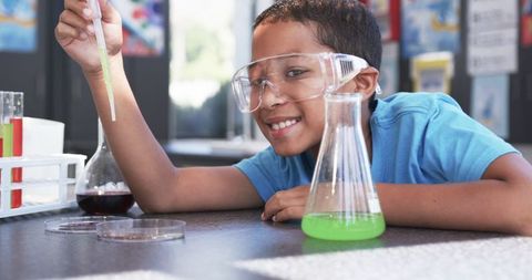 Young Student Observing Chemical Reaction in Science Class - Download Free Stock Images Pikwizard.com
