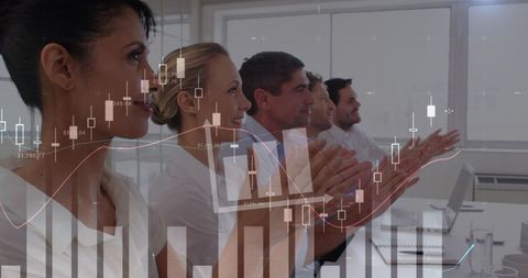 Business Team Applauding with Overlay of Trading Chart and Data Analytics