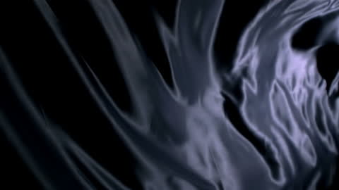 Flowing Black Silk Sheet Capturing Elegance in Motion