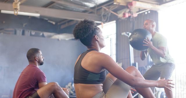 Group of Athletes Engaging in CrossFit Training at Gym - Download Free Stock Images Pikwizard.com