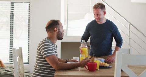 Relaxed Breakfast Moment with Multi-Ethnic Gay Couple at Home - Download Free Stock Images Pikwizard.com