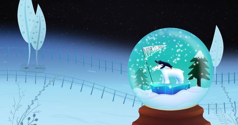 Festive christmas snow globe with polar bear at north pole