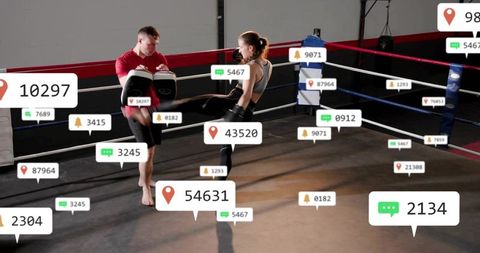 Female athlete delivering kick to trainer in boxing ring with social media callouts