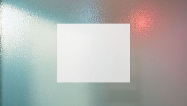 Minimalist frosted glass panel with ambient lighting