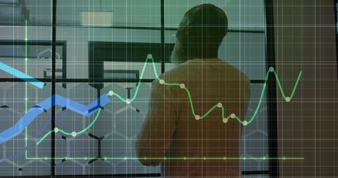 Senior Manager Analyzing Financial Trends on Glass Wall - Download Free Stock Images Pikwizard.com