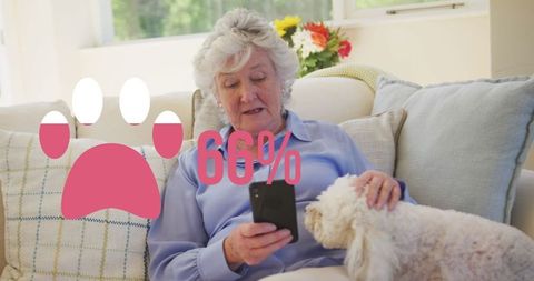 Senior Woman with Dog Using Smartphone Relaxing at Home