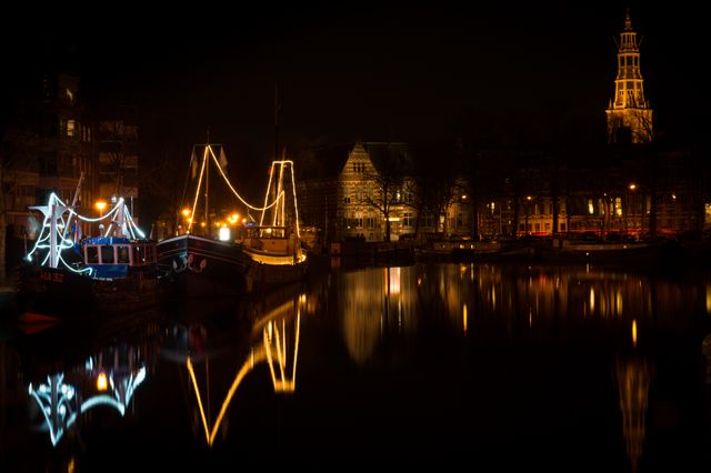 Historical City Canal at Night with Illuminated Boats and Reflections - Download Free Stock Photos Pikwizard.com