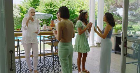 Bridal shower celebration outdoors with joyful guests