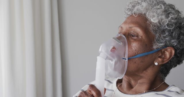 Senior Woman Using Oxygen Inhaler Mask at Home - Download Free Stock Images Pikwizard.com