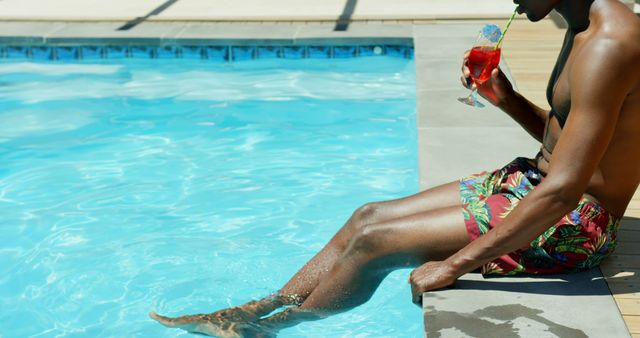 Person Relaxing by Poolside Enjoying Tropical Drink in Summer - Download Free Stock Images Pikwizard.com