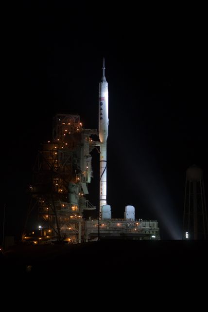 CAPE CANAVERAL, Fla. - As night settles over Launch Complex 39B at NASA's Kennedy Space Center in Florida, xenon lights reveal the Ares I-X rocket awaiting the approaching liftoff of its flight test.    This is the first time since the Apollo Program's Saturn rockets were retired that a vehicle other than the space shuttle has occupied the pad.   Part of the Constellation Program, the Ares I-X is the test vehicle for the Ares I.  The Ares I-X flight test is set for Oct. 27.  For information on the Ares I-X vehicle and flight test, visit http://www.nasa.gov/aresIX. Photo credit: NASA/Kim Shiflett