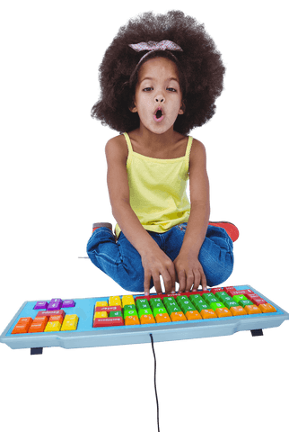 child engaging with colorful transparent keyboard - Download Free Stock Videos Pikwizard.com