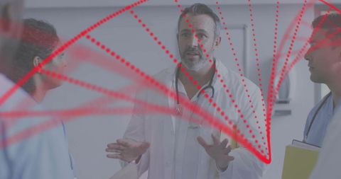 Lead physician briefing clinical team on glass board with red diagram for patient planning