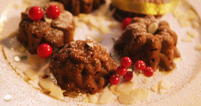 Festive Chocolate Cakes with Red Berries and Almonds, Dusting of Sugar - Download Free Stock Images Pikwizard.com