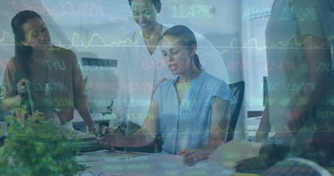 Diverse Team Collaborating with Data Overlay in Modern Office