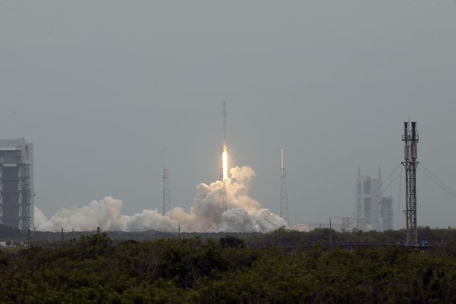 CAPE CANAVERAL, Fla. - The SpaceX Falcon 9 rocket rises above the lightning masts on Space Launch Complex 40 at Cape Canaveral Air Force Station, carrying the Dragon resupply spacecraft to the International Space Station. Liftoff was during an instantaneous window at 3:25 p.m. EDT.    Dragon is making its fourth trip to the space station. The SpaceX-3 mission, carrying almost 2.5 tons of supplies, technology and science experiments, is the third of 12 flights through a $1.6 billion NASA Commercial Resupply Services contract. Dragon's cargo will support more than 150 experiments that will be conducted during the station's Expeditions 39 and 40.     For more information, visit http://www.nasa.gov/mission_pages/station/structure/launch/index.html.  Photo credit: NASA/George Roberts