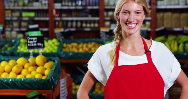 Suitable for depicting positive customer service, staff training, or advertising for grocery store hiring. Can also be utilized in promotional materials for fresh produce and organic food items or a community-focused supermarket.