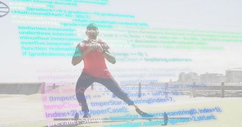 Lunging laterally wearing prosthetic running blade on waterfront path with code overlay