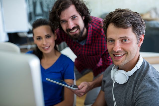 Creative Team Collaborating at Office Desk - Download Free Stock Images Pikwizard.com