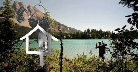 Key and House Outline Over Nature and Man by Lake