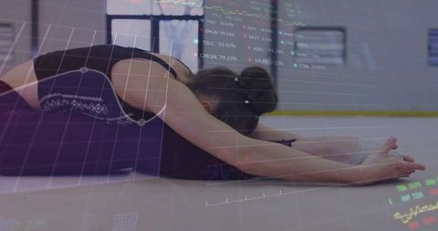 Teen female athlete stretching on mat with fitness data overlay for training analysis