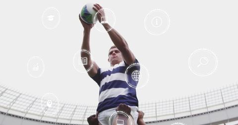 Rugby Player Caught in Mid-Air Catch with Digital Overlay Icons
