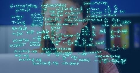 Innovative Young Woman Solving Complex Equations on Laptop