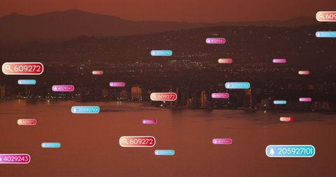 Social Media Icons Overlay on Sunset City Skyline and Sea