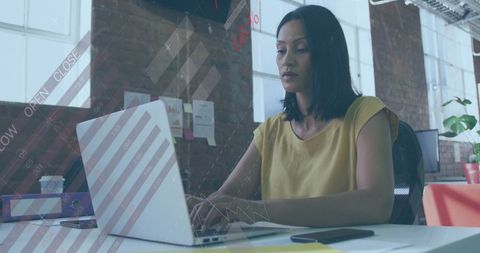Businesswoman Analyzing Digital Financial Reports in Modern Office