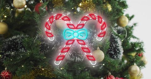 Neon Candy Canes on Christmas Tree with Festive Decorations