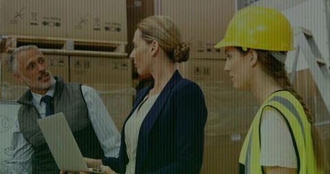 Warehouse management meeting among diverse team