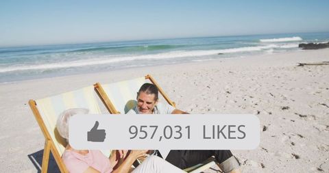 Social Media Interaction Couple Relaxing Beach Scene