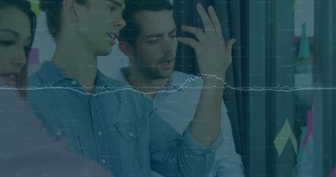 Team collaboration in modern office with data analysis overlay