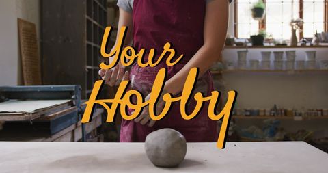 Female Potter Crafting Clay Ball in Bright Workshop