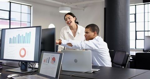 Collaborative teamwork in modern office with digital tools