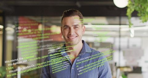 Smiling developer presenting code overlay in modern workspace