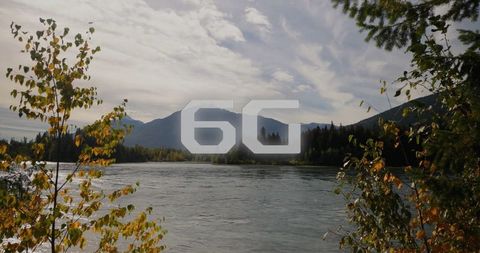 Idyllic autumn mountain landscape centered on serenity with river