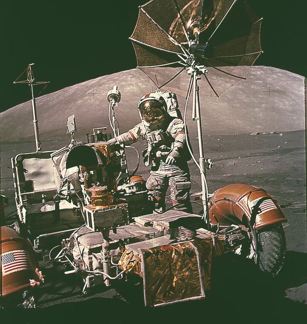 This is an Apollo 17 onboard photo of an astronaut beside the Lunar Roving Vehicle (LRV) on the lunar surface. Designed and developed by the Marshall Space Flight Center and built by the Boeing Company, the LRV was first used on the Apollo 15 mission and increased the range of astronauts' mobility and productivity on the lunar surface. This lightweight electric car had battery power sufficient for about 55 miles. It weighed 462 pounds (77 pounds on the Moon) and could carry two suited astronauts, their gear, cameras, and several hundred pounds of bagged samples. The LRV's mobility was quite high. It could climb and descend slopes of about 25 degrees.